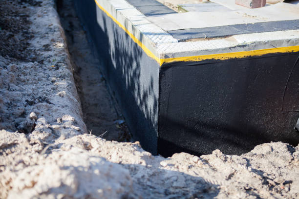 Professional Exterior Waterproofing technician working in Liberty, KY